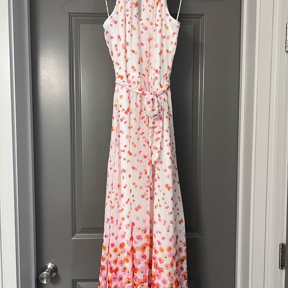 Floral DKNY midi length dress. Light and comfortable with adjustable tie waist